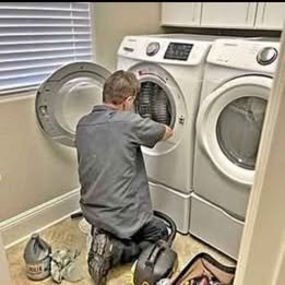 Appliance Repair professional at work