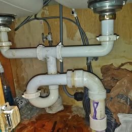 Plumbing professional at work
